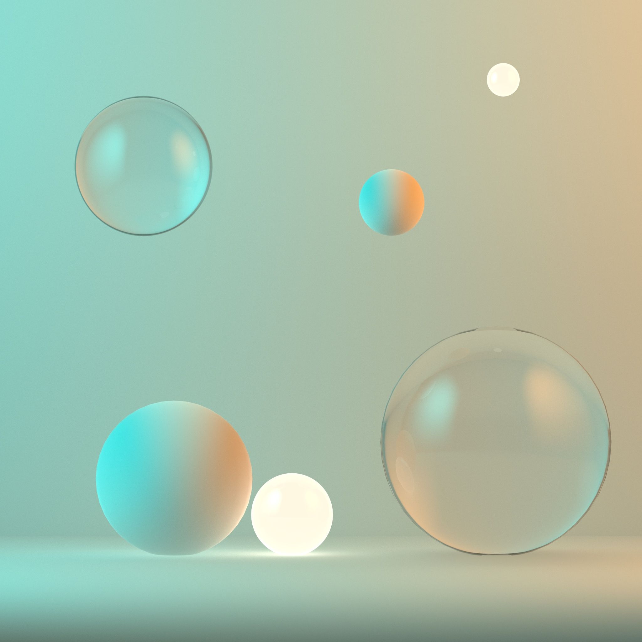 Glass spheres on a mint and peach backdrop