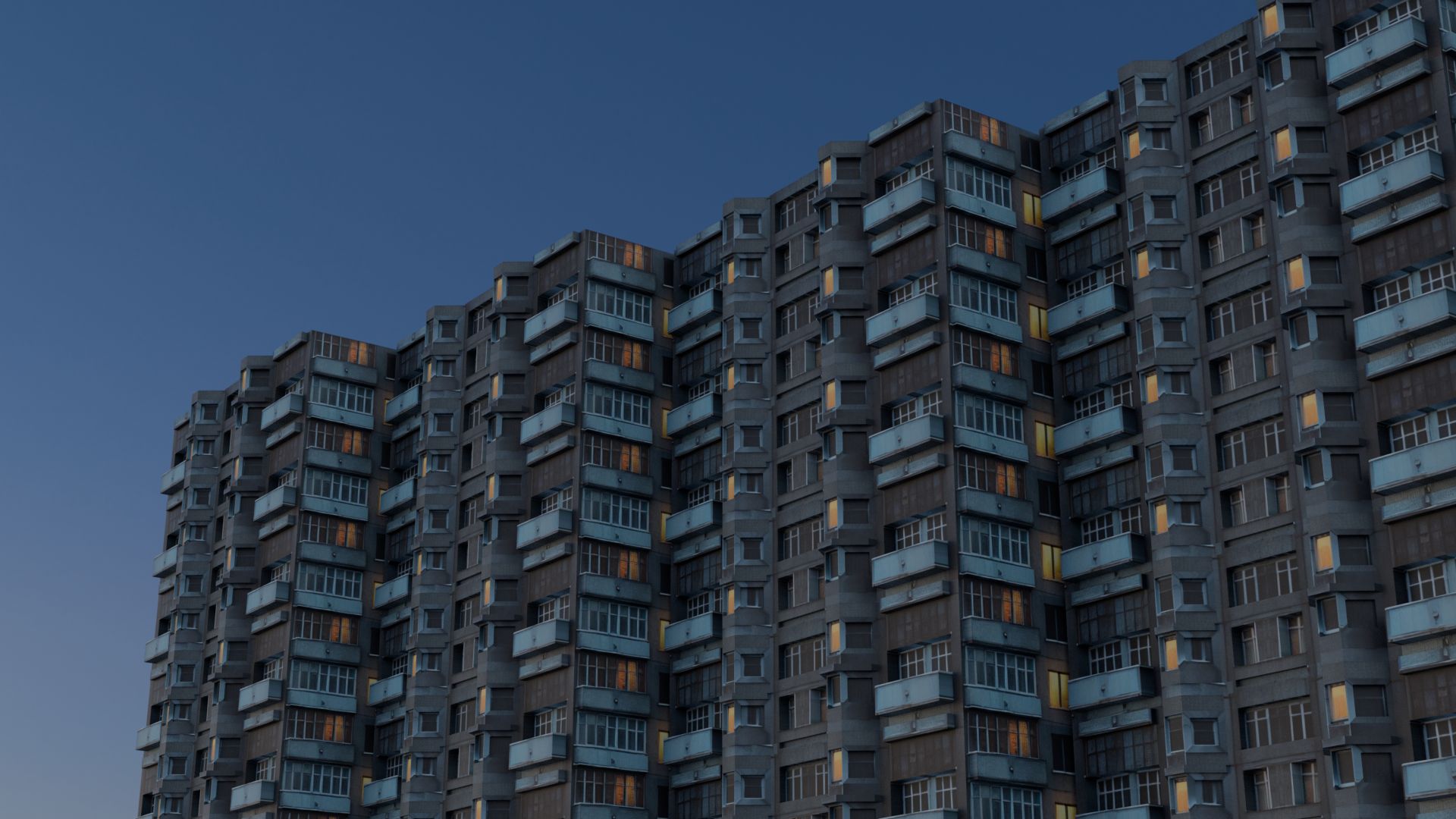 Apartment complex against a blue sky